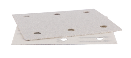 Två vita sandpapper med hål, staplade på varandra.