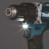 Borrmaskin med svart och blått handtag och justerbar hastighet. Märkt "Makita".