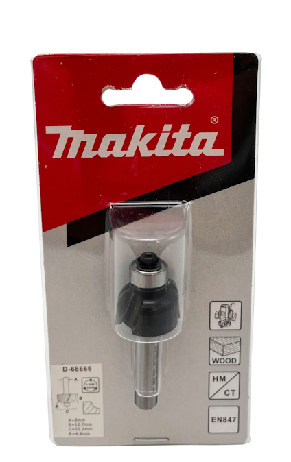 Förpackning med Makita hålkälsfräs, svart och silver, i genomskinlig plast, med röd och grå bakgrund.