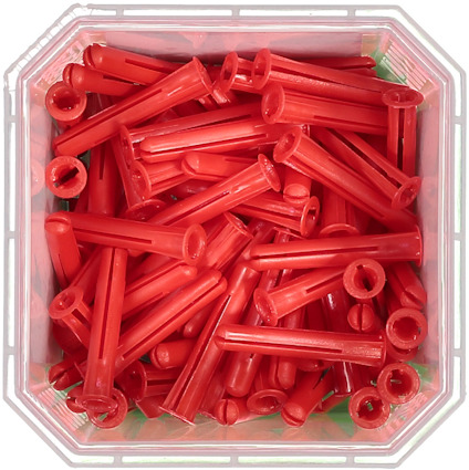 Röda plastpluggar i en transparent behållare.